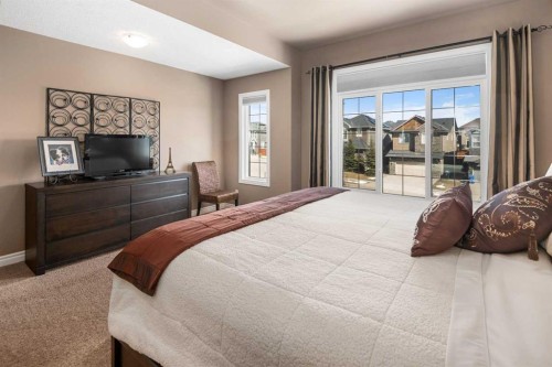 323 Nolan Hill Boulevard Nw, Calgary, AB - Indoor Photo Showing Bedroom