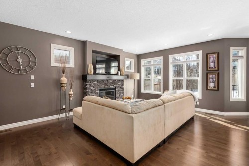 323 Nolan Hill Boulevard Nw, Calgary, AB - Indoor Photo Showing Living Room With Fireplace