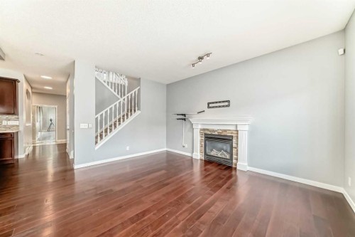 46 Saddlecrest Gardens Ne, Calgary, AB - Indoor Photo Showing Living Room With Fireplace