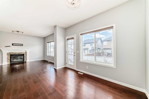 46 Saddlecrest Gardens Ne, Calgary, AB - Indoor With Fireplace