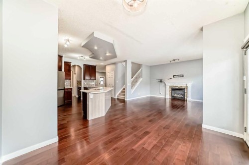 46 Saddlecrest Gardens Ne, Calgary, AB - Indoor With Fireplace