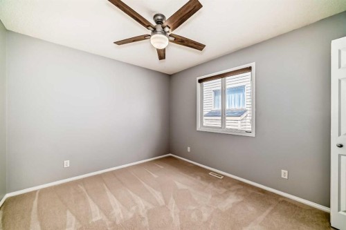 46 Saddlecrest Gardens Ne, Calgary, AB - Indoor Photo Showing Other Room