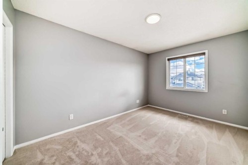 46 Saddlecrest Gardens Ne, Calgary, AB - Indoor Photo Showing Other Room