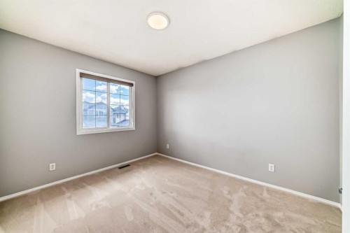 46 Saddlecrest Gardens Ne, Calgary, AB - Indoor Photo Showing Other Room