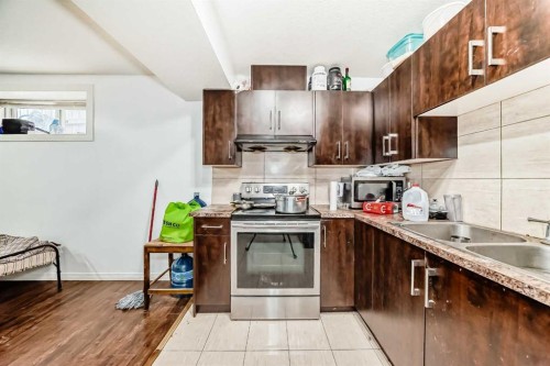 46 Saddlecrest Gardens Ne, Calgary, AB - Indoor Photo Showing Kitchen With Double Sink