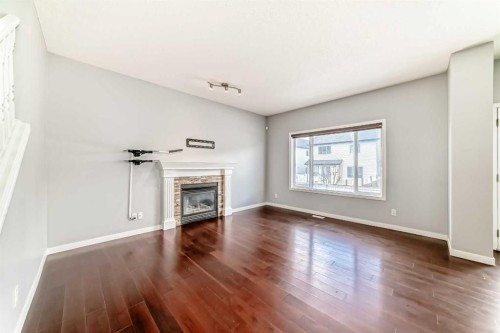 46 Saddlecrest Gardens Ne, Calgary, AB - Indoor With Fireplace