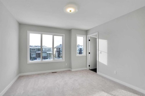 144 Cobblestone Gate Sw, Airdrie, AB - Indoor Photo Showing Other Room