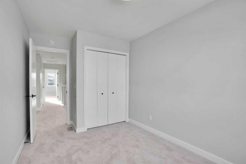 144 Cobblestone Gate Sw, Airdrie, AB - Indoor Photo Showing Other Room