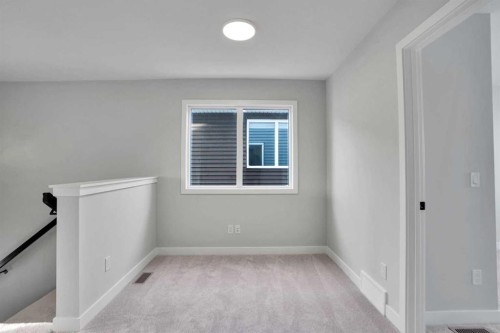 144 Cobblestone Gate Sw, Airdrie, AB - Indoor Photo Showing Other Room