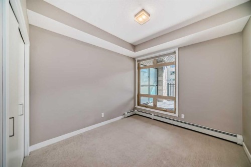 109-823 5 Avenue Nw, Calgary, AB - Indoor Photo Showing Other Room