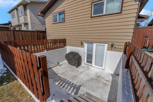 1003 Berkley Drive Nw, Calgary, AB - Outdoor With Deck Patio Veranda With Exterior