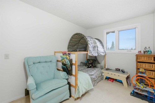 52A Millcrest Green Sw, Calgary, AB - Indoor Photo Showing Bedroom