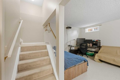 52A Millcrest Green Sw, Calgary, AB - Indoor Photo Showing Other Room