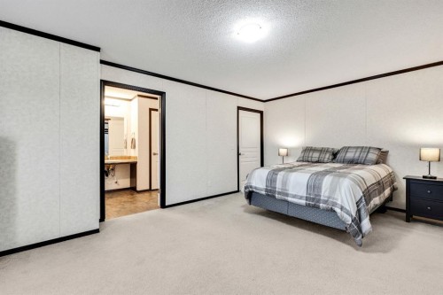 117 Range Rd 250, Mossleigh, AB - Indoor Photo Showing Bedroom