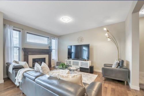 173 Redstone Common Ne, Calgary, AB - Indoor Photo Showing Living Room With Fireplace