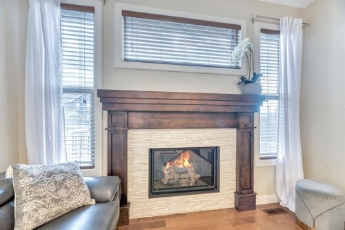 173 Redstone Common Ne, Calgary, AB - Indoor Photo Showing Living Room With Fireplace