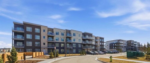 313-700 Shawnee Square Sw, Calgary, AB - Outdoor With Balcony With Facade