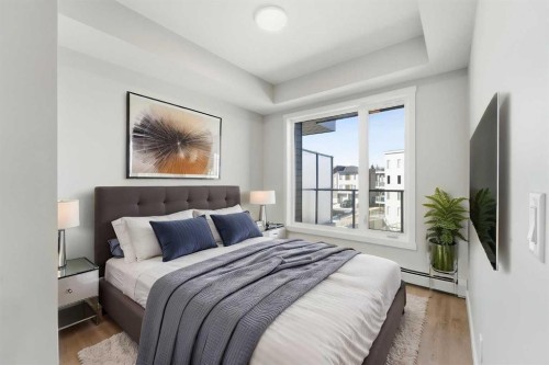 313-700 Shawnee Square Sw, Calgary, AB - Indoor Photo Showing Bedroom