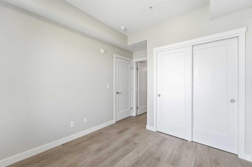 313-700 Shawnee Square Sw, Calgary, AB - Indoor Photo Showing Other Room
