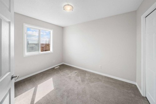 99 Covemeadow Close Ne, Calgary, AB - Indoor Photo Showing Other Room
