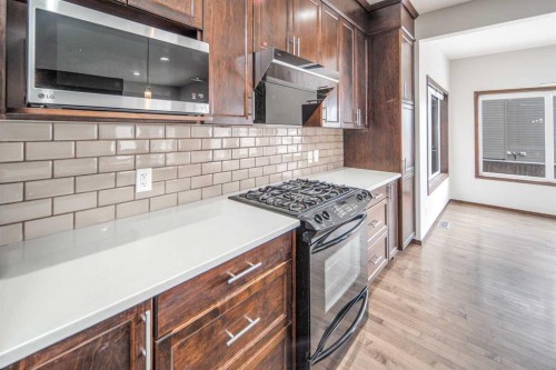 47 Pantego Avenue Nw, Calgary, AB - Indoor Photo Showing Kitchen With Upgraded Kitchen