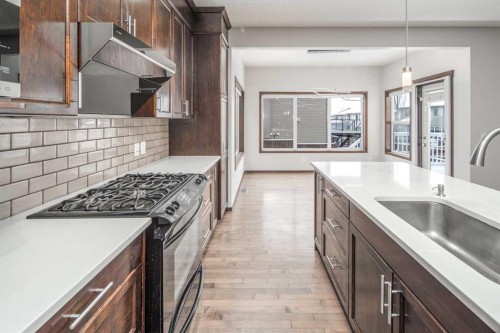 47 Pantego Avenue Nw, Calgary, AB - Indoor Photo Showing Kitchen With Upgraded Kitchen