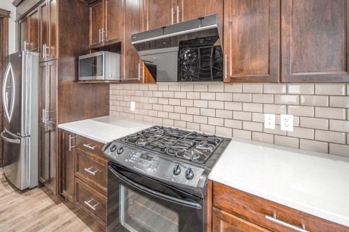 47 Pantego Avenue Nw, Calgary, AB - Indoor Photo Showing Kitchen With Upgraded Kitchen