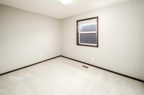 47 Pantego Avenue Nw, Calgary, AB - Indoor Photo Showing Other Room