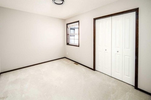 47 Pantego Avenue Nw, Calgary, AB - Indoor Photo Showing Other Room