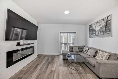516-95 Skyview Close Ne, Calgary, AB - Indoor Photo Showing Living Room