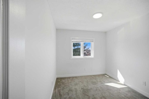 24 Martindale Drive Ne, Calgary, AB - Indoor Photo Showing Other Room