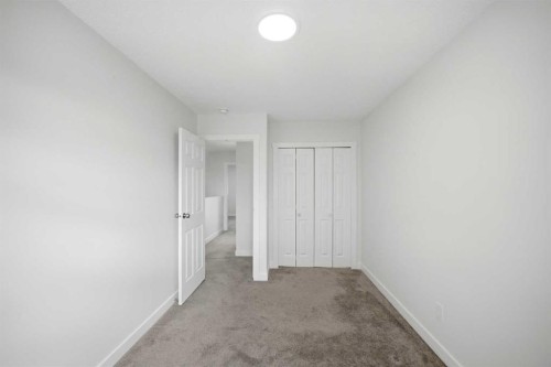 24 Martindale Drive Ne, Calgary, AB - Indoor Photo Showing Other Room
