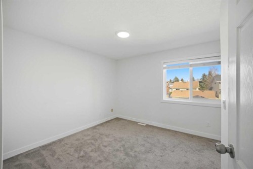 24 Martindale Drive Ne, Calgary, AB - Indoor Photo Showing Other Room