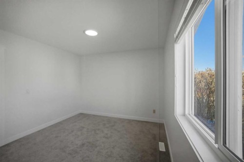 24 Martindale Drive Ne, Calgary, AB - Indoor Photo Showing Other Room