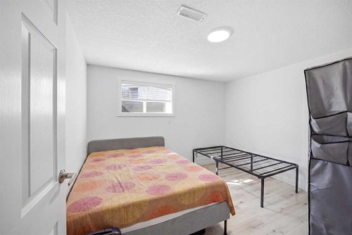 24 Martindale Drive Ne, Calgary, AB - Indoor Photo Showing Bedroom