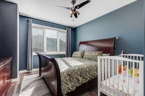 24 Elgin Meadows Manor Se, Calgary, AB - Indoor Photo Showing Bedroom