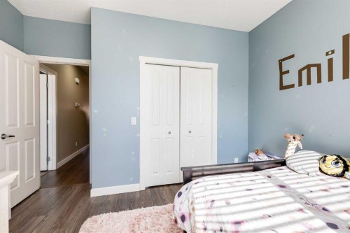 24 Elgin Meadows Manor Se, Calgary, AB - Indoor Photo Showing Bedroom