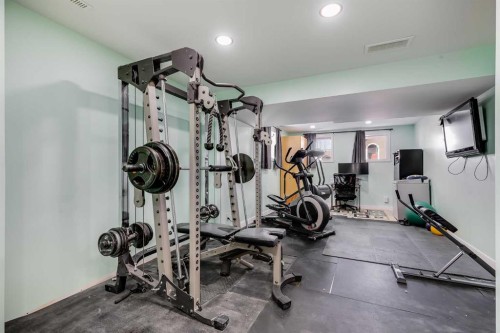 24 Elgin Meadows Manor Se, Calgary, AB - Indoor Photo Showing Gym Room