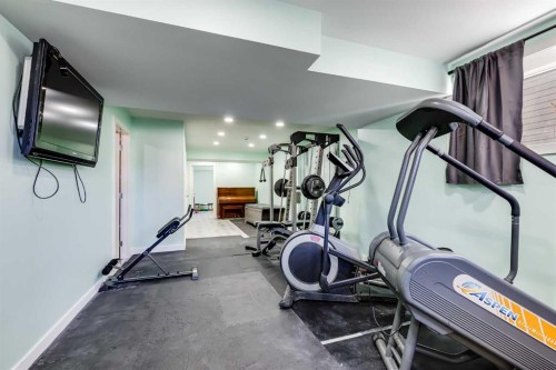 24 Elgin Meadows Manor Se, Calgary, AB - Indoor Photo Showing Gym Room