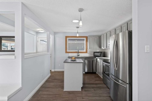 9519 3 Street Se, Calgary, AB - Indoor Photo Showing Kitchen With Stainless Steel Kitchen