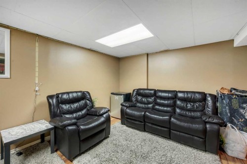 61-175 Manora Place Ne, Calgary, AB - Indoor Photo Showing Basement