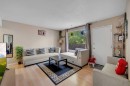 61-175 Manora Place Ne, Calgary, AB  - Indoor Photo Showing Living Room 