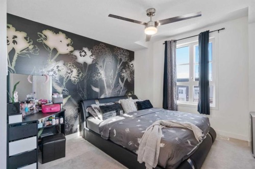 960 Walden Drive Se, Calgary, AB - Indoor Photo Showing Bedroom
