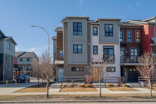 960 Walden Drive Se, Calgary, AB - Outdoor With Balcony With Facade