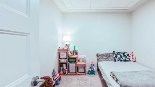 404-125 Wolf Hollow Crescent Se, Calgary, AB - Indoor Photo Showing Bedroom