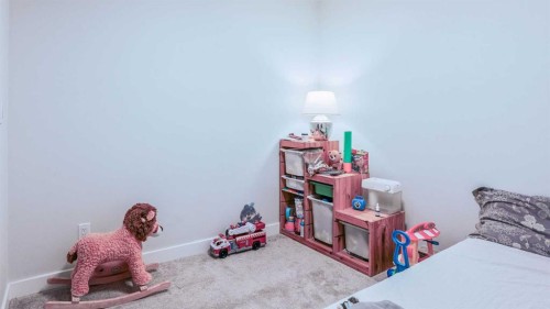 404-125 Wolf Hollow Crescent Se, Calgary, AB - Indoor Photo Showing Bedroom