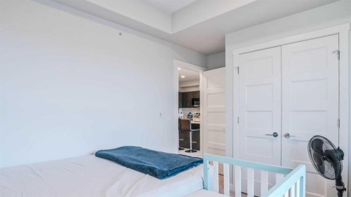 404-125 Wolf Hollow Crescent Se, Calgary, AB - Indoor Photo Showing Bedroom