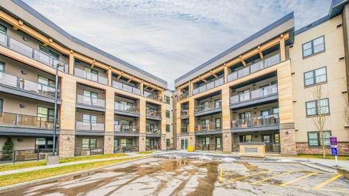 404-125 Wolf Hollow Crescent Se, Calgary, AB - Outdoor With Facade