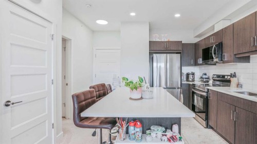 404-125 Wolf Hollow Crescent Se, Calgary, AB - Indoor Photo Showing Kitchen