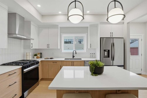 72 Buffaloberry Manor Se, Calgary, AB - Indoor Photo Showing Kitchen With Upgraded Kitchen